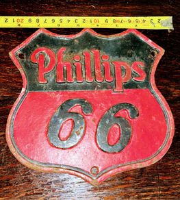 1960s cast metal wall sign advertising Phillip's 66 petroleum company