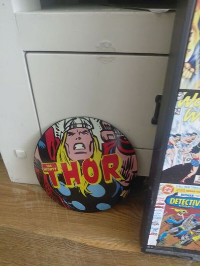 large wooden framed super heroes and villans wall hanging and 2 metal wallhanging discs