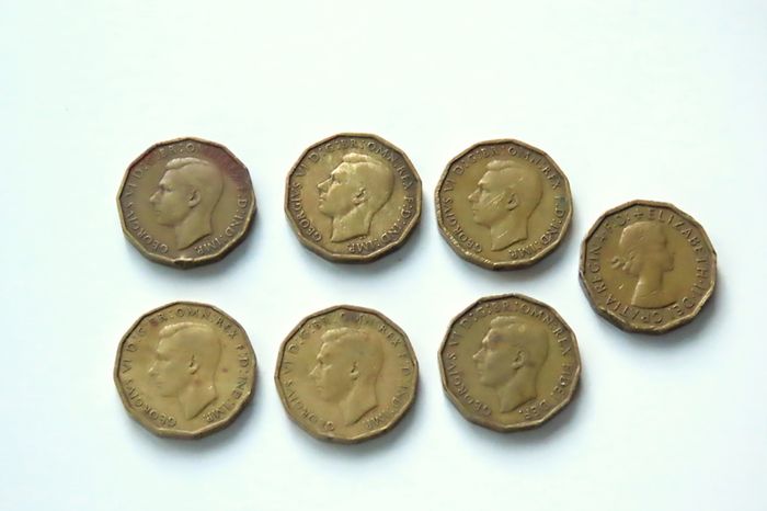 Brass old British threepence coins X 7