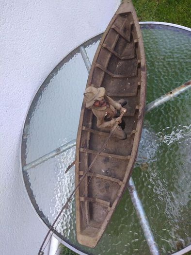 Antique fisherman and boat