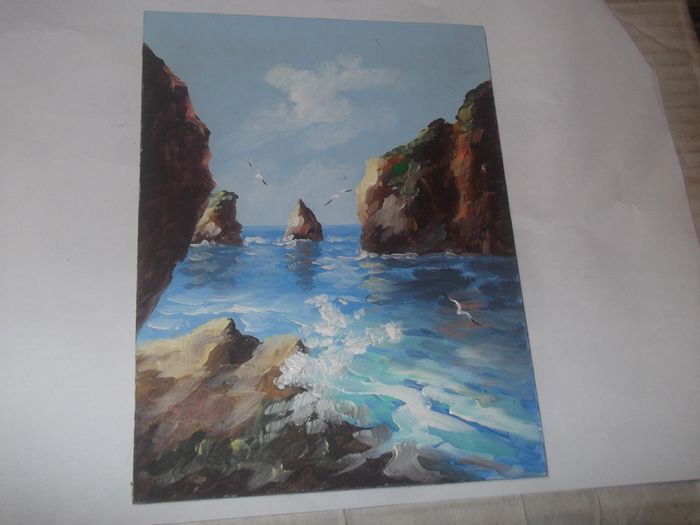 a small oil painting on board of the sea