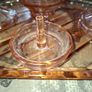 Pink Glass Art Deco Vanity Set, likely dating from the 1920s or 1930s. The set includes a Container, a Ring Holder, Two Candlesticks, and a Vanity Tray, Postage or Collection Image 2