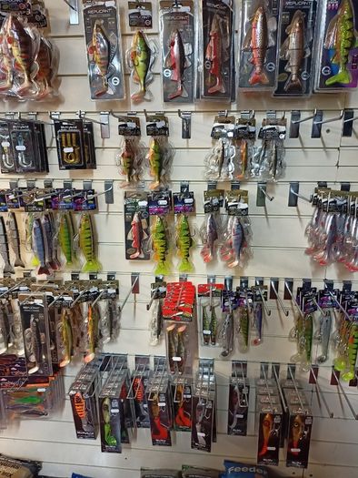 Fishing bait rods lines reels waders lures feeds jackets rod holders and other fishing gear