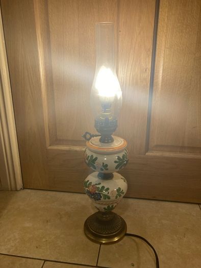 Old style lamp with globe electric postage available