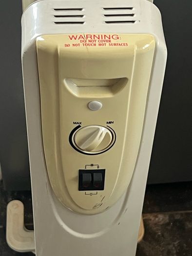 Neat oil heater