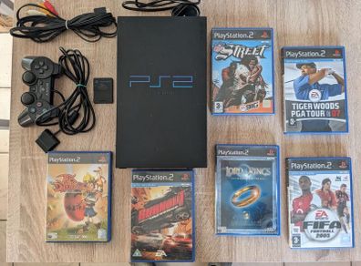 PS2 console with games