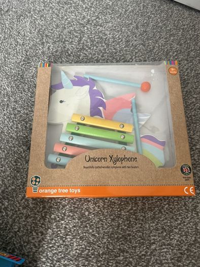 Hot wheels car trucks bundle cement trucks and Unicorn Xylophone