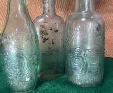 3 old Bottles inc, a Schweppes skittle