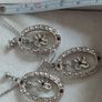 Beautiful set of silver tone jewelry. Image 2