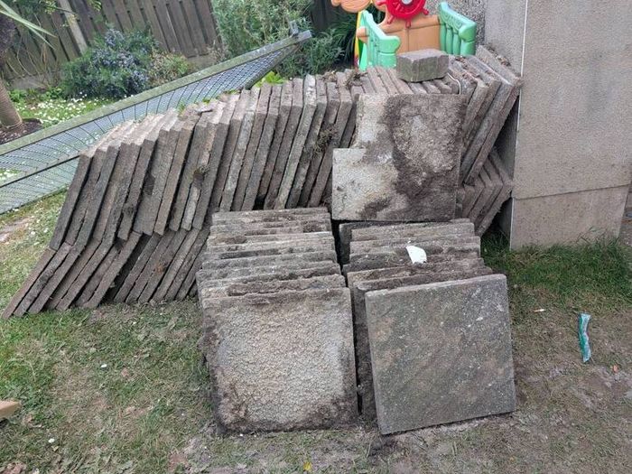 Roughly 100 patio slabs