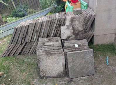 Roughly 100 patio slabs