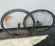 A Set of 9 Speed Racing wheels and tyres STRAIGHT WHEELS