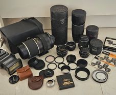 Collection of camera lenses 500mm 300mm 135mm 55mm 28mm