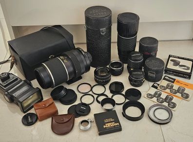 Collection of camera lenses 500mm 300mm 135mm 55mm 28mm