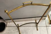 Vintage leaded glass with curved brass screen .