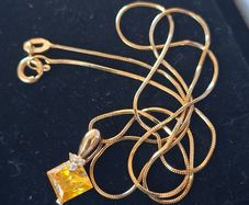 10 ct Gold Pendant with Natural Topaz and Diamonds