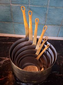 Graduated set French tinned Brass Pots and pans