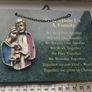 A vintage green marble wall plaque with a metal sculpture of the Holy Family. Image 3