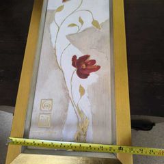 Large floral wall art in gold frame