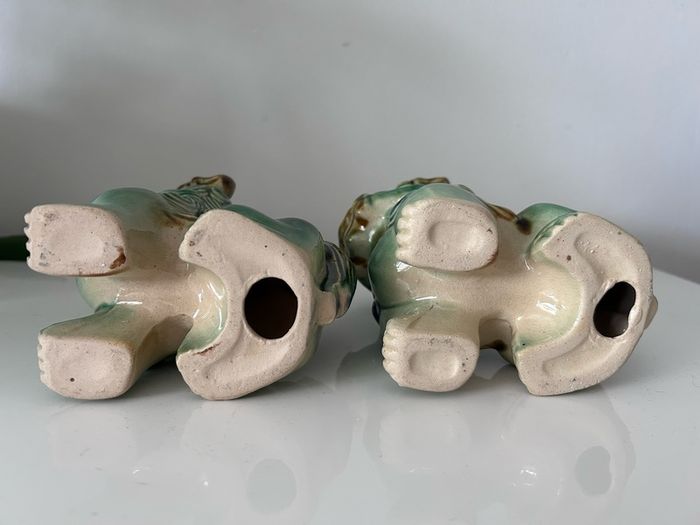 Two vintage Foo dogs in beautiful green glaze