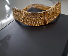 Intricate 18ct solid bangle