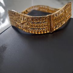 Intricate 18ct solid bangle