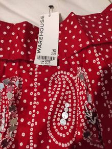 Brand new Warehouse skirt red and black