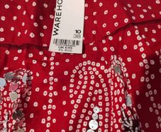 Brand new Warehouse skirt red and black