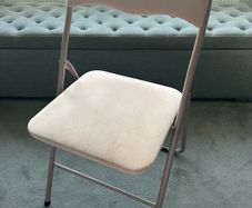 pink folding chair
