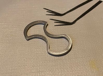 1 euro / 2 euro double-sided, removable shopping trolley token.