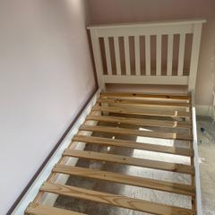 White wooden single bed