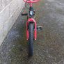 Children's black and red ninja bike Image 2