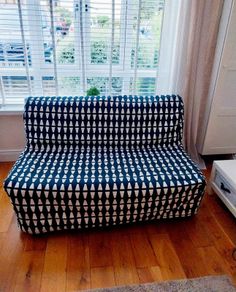 IKEA 2-Seat Sofa-Bed (Black & White Geometric)