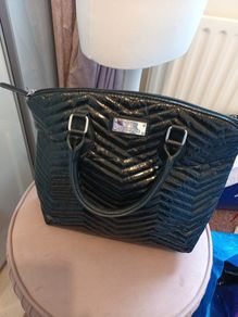Black patent handbag from next