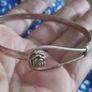 Vintage sterling silver bracelet with a rose-shaped clasp. Image 7