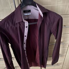 Two designer shirts washed but never worn
