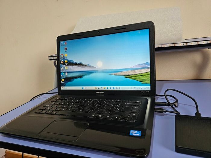 HP Compaq CQ58 Laptop Intel Celeron, 8GB RAM, Samsung 128GB SSD + Extra Storage Toshiba 750GB External USB HDD.