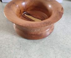 Beautiful  handmade wood turning. wood bowl has natural knot inside the bowl excellent condition