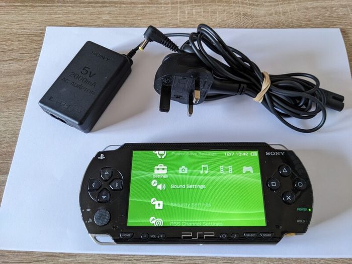 PSP original console with charger and battery