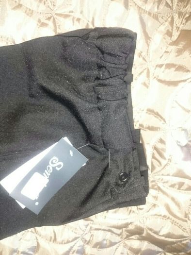 brand new elegant black trousers, size 7-9y