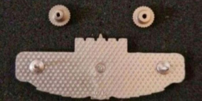 China ,  peoples liberation army artillery badge.