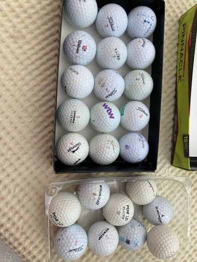 Two Dozen Used Golf Balls.