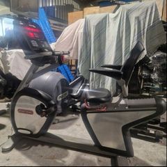 2 Left Star Trac Recumbent Bikes