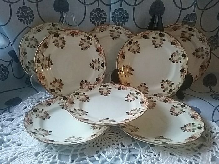 Eight Osbourne China Side Plates