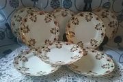 Eight Osbourne China Side Plates