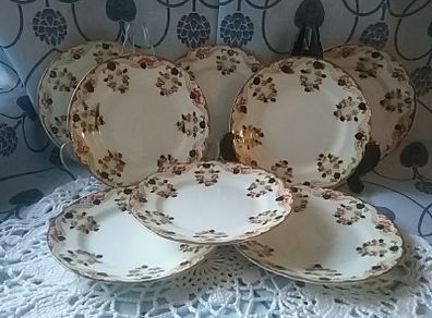 Eight Osbourne China Side Plates