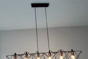 Black and copper pendant light ceiling cage kitchen Island