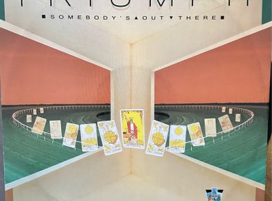 Triumph. Limited edition 12" single. Somebody's out there in nm condition