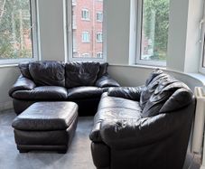 free leather couches and pouffe