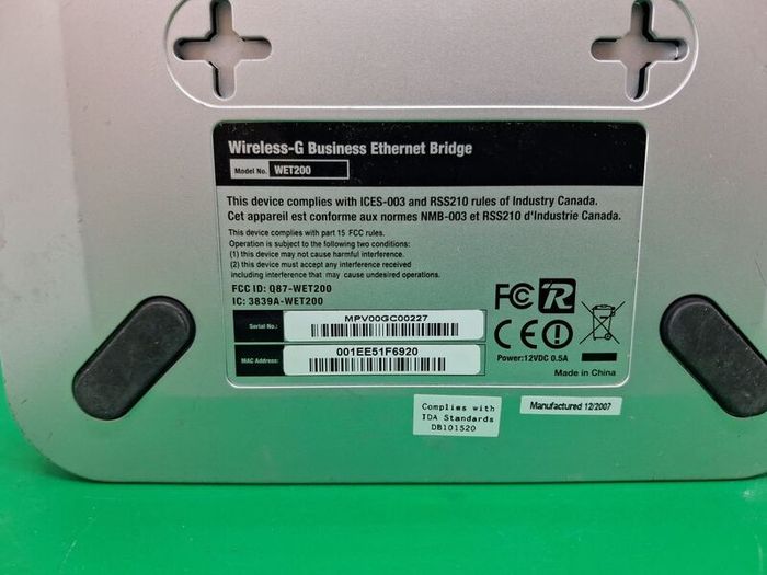 Postage - Linksys Cisco WET200 Wireless Ethernet Bridge Router.